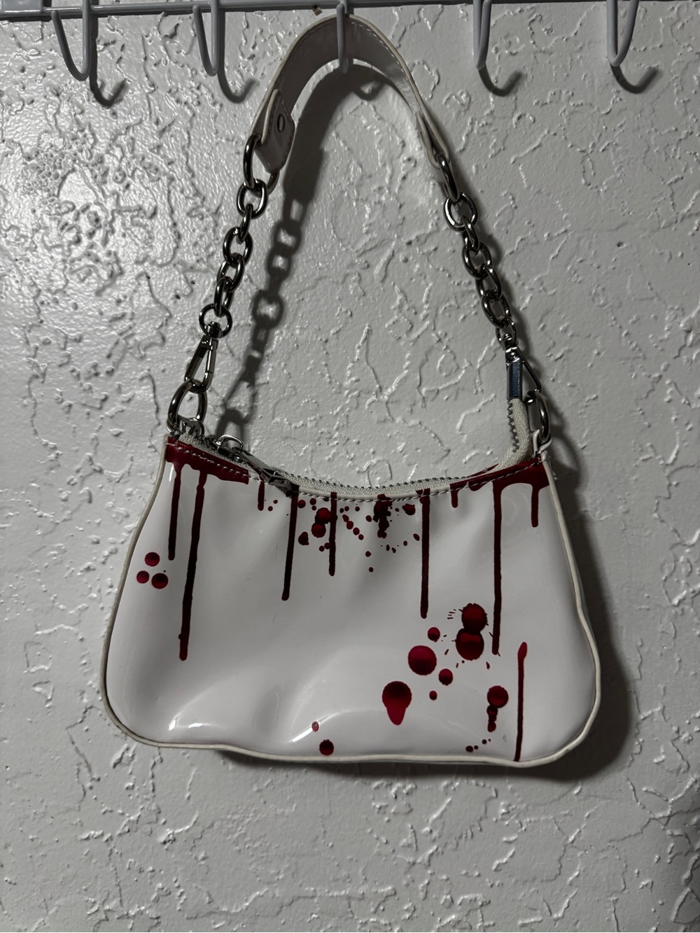 Trickz N' Treatz Blood Splatter Baguette Shoulder
Bag - White - Dolls Kill
